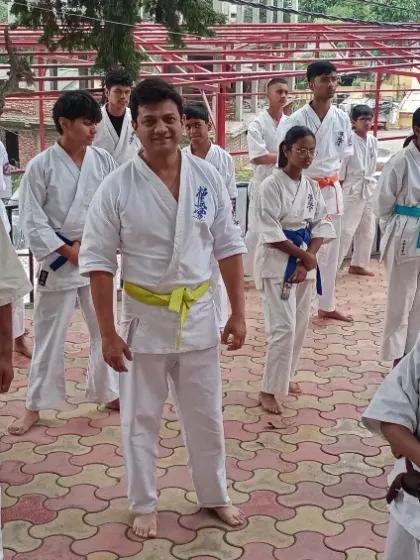 A moment with my students and fellow instructors during a practice session. Teamwork is at the heart of our academy.