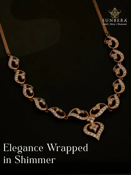 Elegance wrapped in shimmer, this gold and diamond necklace features a flowing, heart-centric design. The paisley-like motifs are studded with diamonds, creating a piece that is both graceful and glamorous.