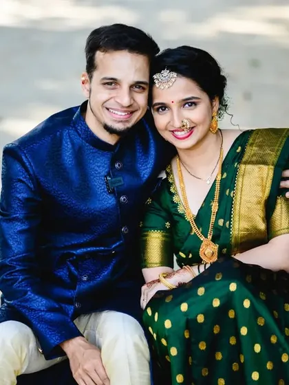 A sweet and simple portrait of the newlyweds. Sanjana and Mihir look so happy and content sitting together.