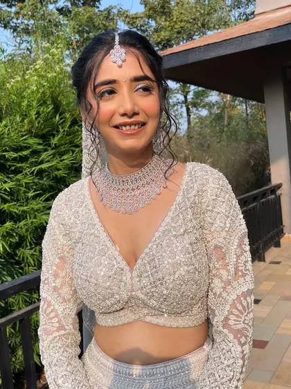 A candid smile from my happy bride. Her makeup is subtle yet impactful, creating a timeless look that she will cherish in her wedding photos for years to come.