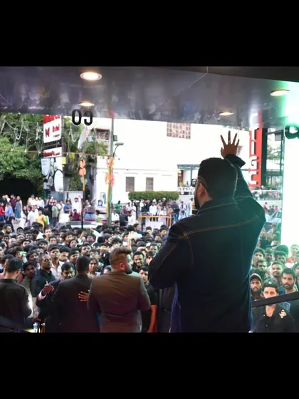 Facing a massive crowd of fans at the store launch. There's nothing like the energy of hundreds of people cheering, and I love being the one to conduct that energy.