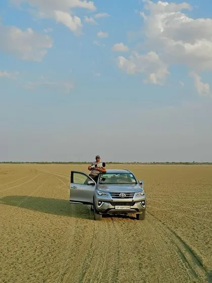 Standing by my vehicle, I use a drone to get a unique perspective of the landscape. We use every tool at our disposal to capture the beauty of these remote locations.