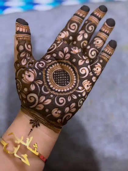 Another angle of the cutwork design, highlighting the delicate details.