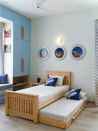 A duplicate of image 147, showing the trundle bed pulled out and ready for a guest.