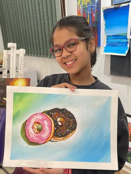 How delicious do these donuts look? This student used poster colors to create this sweet painting, practicing her shading and highlighting skills.