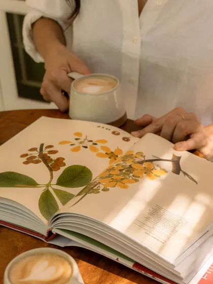 This is what slow moments look like here. A beautifully illustrated book from our Champaca collection paired with a perfectly crafted plant-based latte. It’s about finding joy in the simple, quiet details of the day.