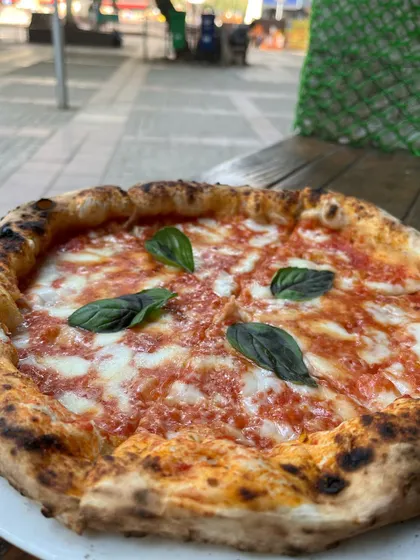 Classic. Timeless. Delicious. Our Margherita pizza is all three.
