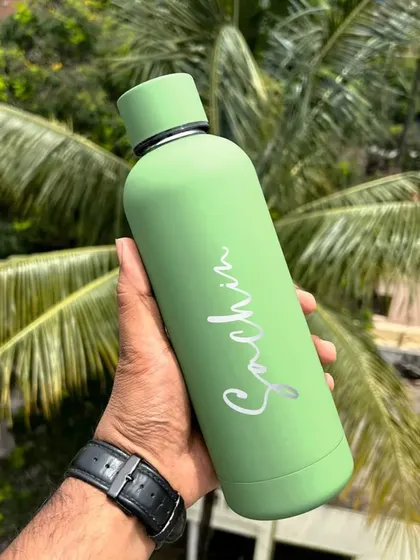 The Hot & Cold Solid Flask is also available in this lovely pastel green. The engraved name has a clean, silver appearance against the matte color.