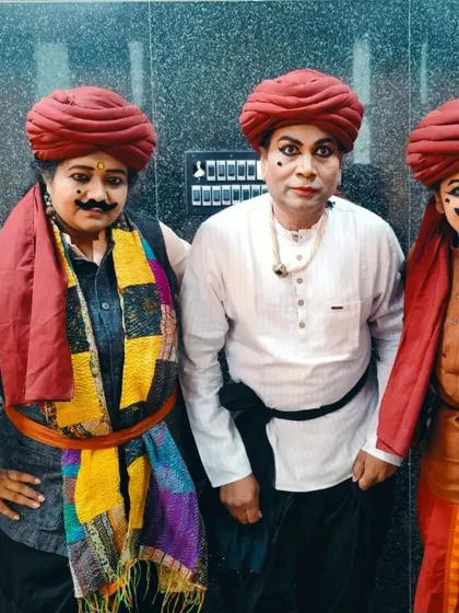 Three of us portraying folk characters, showcasing the rustic charm and energy of the roles.