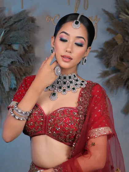 A delicate pose showing the soft makeup details, from the blended eyeshadow to the perfectly defined brows, fit for a queen.