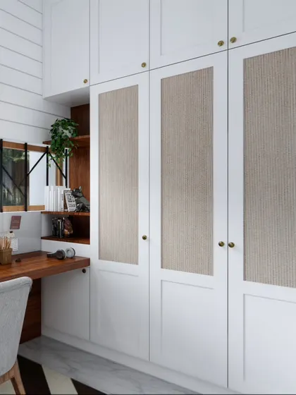 A render of a study area with a white shiplap wall and a wardrobe featuring natural textured panels, creating a bright and productive workspace.
