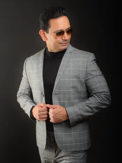 Adding sunglasses can give a corporate portrait a cool, contemporary edge. It's a great option for a more casual or lifestyle-oriented branding shot.