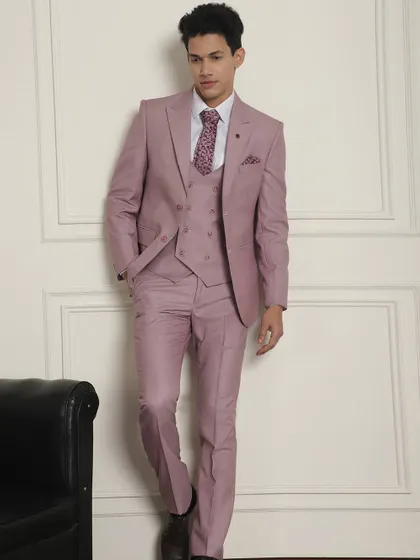 Summer occasion wear calls for pastel colors. This dusty pink three-piece suit is perfect for day-to-evening events.