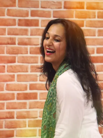 A happy, natural smile. I believe a positive attitude is the key to a great performance.