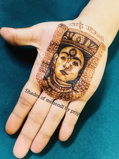 A powerful portrait of the goddess Vitthal, also known as Vithoba, with 'Aai Mauli' written above. This is a deeply spiritual design for many of my clients.