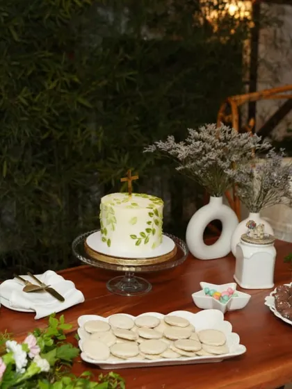 The dessert table setup for the Holy Communion and Baptism celebration. My cake looks right at home amongst the other delicious treats and beautiful decor.