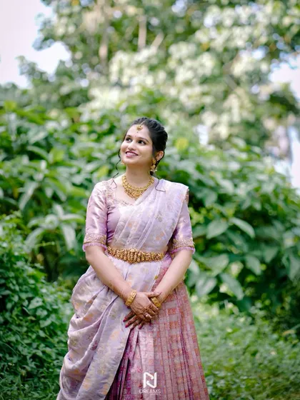 Another beautiful shot of Rishika, capturing her joy and the elegance of her custom outfit.