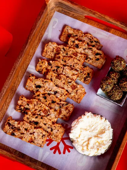 An ideal platter for your next get-together. My Fruit 'N' Nut Crisps served with Eleftheria's Fromage Blanc and Chèvre Truffles make for an effortlessly elegant appetizer.