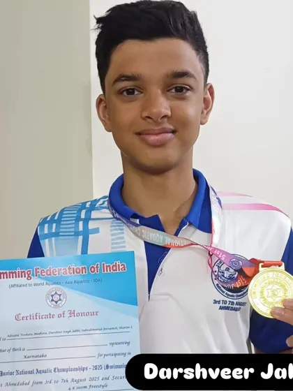 Darshveer Jabbi with his gold from the 4x100m Freestyle Relay.