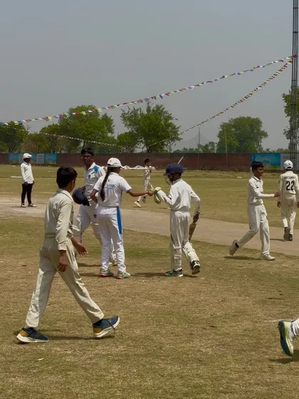 Players shaking hands and celebrating the victory together.