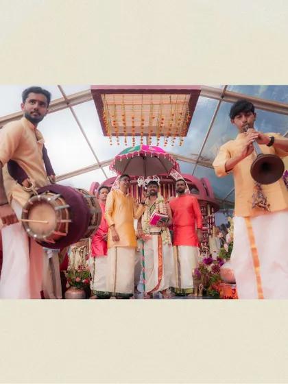 The Kashiyatra is an important pre-wedding ritual in Iyer weddings. The groom's veshti is draped meticulously to hold up during this procession, complete with traditional accessories.