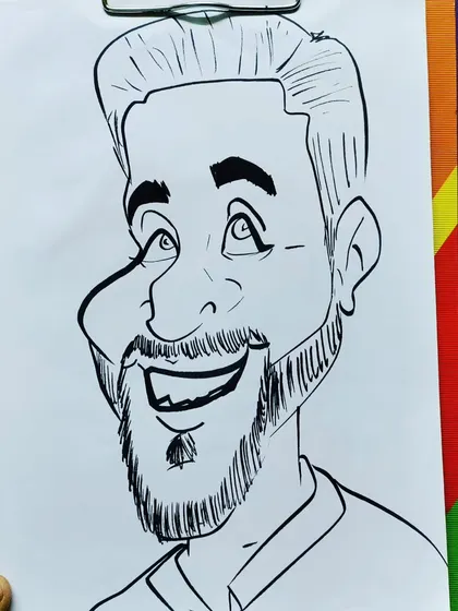 A classic caricature of a man with a beard, looking up with a happy expression.