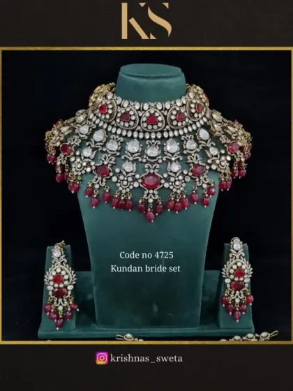 The same Kundan bridal set, available with rich ruby red beads. This is a perfect choice for a bride wearing a traditional red lehenga.