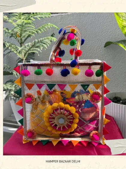 A clear shot of our ₹600 Jute Bag Holi Hamper. The colorful design and generous contents make it one of our best-value festive offerings.