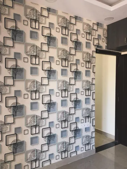 This 3D wallpaper uses squares and tree silhouettes to create a layered, graphic effect. It's a modern choice for adding interest to a wall.