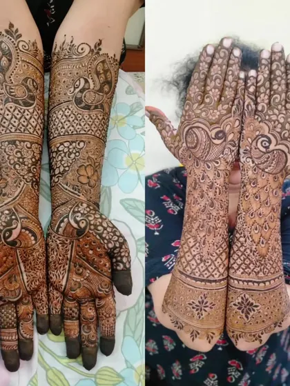 A classic Indian engagement design featuring majestic peacocks on both the palms and forearms, combined with intricate traditional patterns.