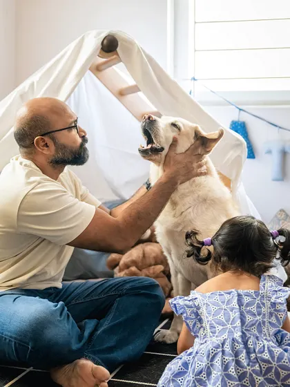 A different angle from Shelby's 10th birthday, with her dad giving her a loving pat. These simple, authentic interactions make the best photographs.