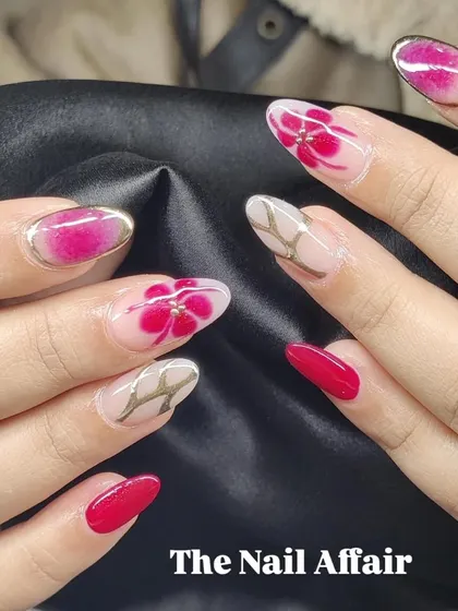 A beautiful mixed-media design combining solid red, abstract florals, and gold chrome accents.