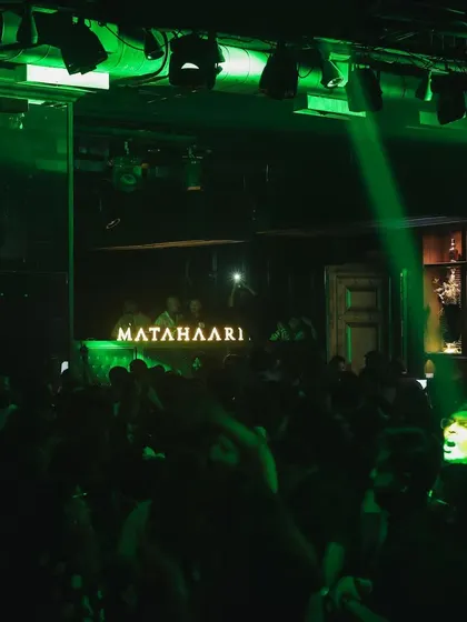 The green glow of Matahaari Nightclub with a full house. The mood is set for a long night of great music.