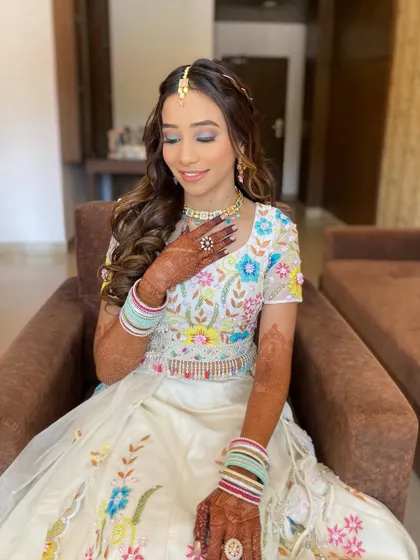 A close-up of Gunjan's soft and pretty makeup. The look is designed to enhance her natural beauty and give her a youthful glow.