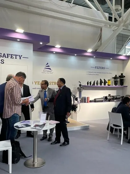 Our team discussing our control valves, safety valves, and filters with international clients at the EIMA 2022 exhibition in Italy.
