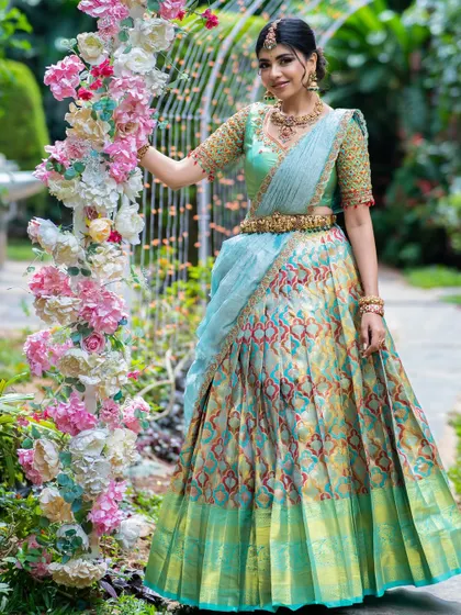 A full view of this unique and artistic half saree, perfect for making a statement at a wedding or festive event.