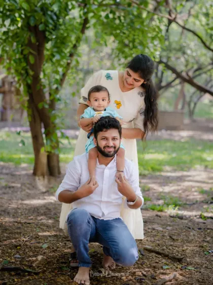 One frame, endless love, pure joy. Outdoor family photoshoots are perfect for capturing natural and happy moments.