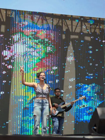 Singing my heart out at the Under 25 Summit. I love commanding a big stage and connecting with every single person in the audience.