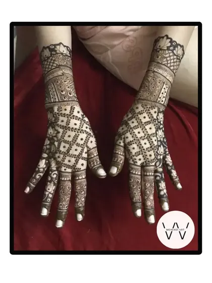The matching pair for the engagement back-hand design, showing perfect symmetry and intricate detailing.