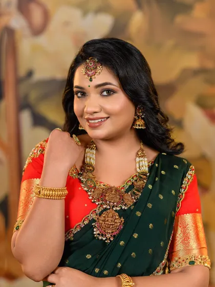 A lovely client looking radiant in our antique jewellery set. The choker and matching jhumkas are perfect for adding a touch of tradition to any festive outfit.