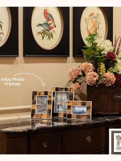 These beautiful inlay photo frames are perfect for displaying cherished memories. The intricate patterns of the frames add a touch of handcrafted, artisanal style to this marble-topped console.