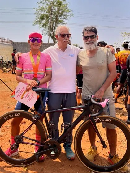 With my father and another supporter after a win at the Bangalore Bicycle Championships. A strong support system is crucial. As your coach, I become a key part of your team, celebrating your victories with you.