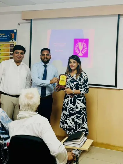 Receiving an award for my performance. This recognition in a high-pressure banking environment honed my skills in navigating complex financial systems, a key advantage in banking law cases.