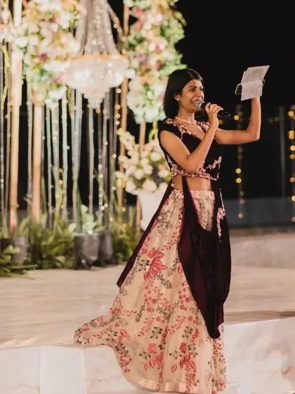 Reading out messages and wishes for the couple during their wedding reception. It's these personal touches that make an event truly memorable.