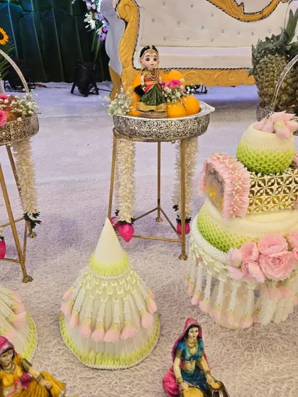A close-up of our premium Thai-inspired baby shower setup. It features intricately carved fruit and vegetable displays, adding an exotic and elegant touch.
