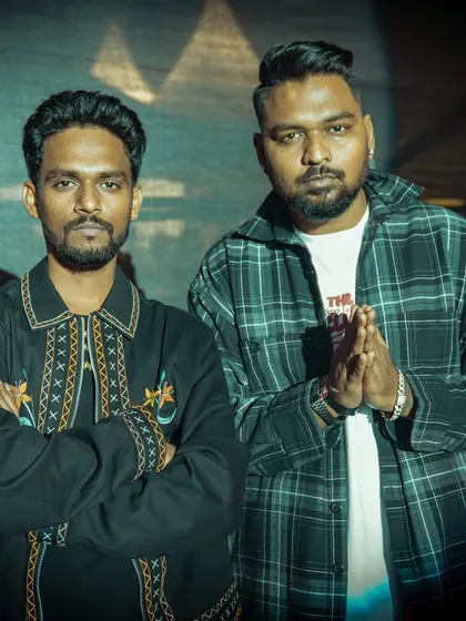 A serious portrait with a fellow artist. We're focused on our craft and pushing the culture forward.