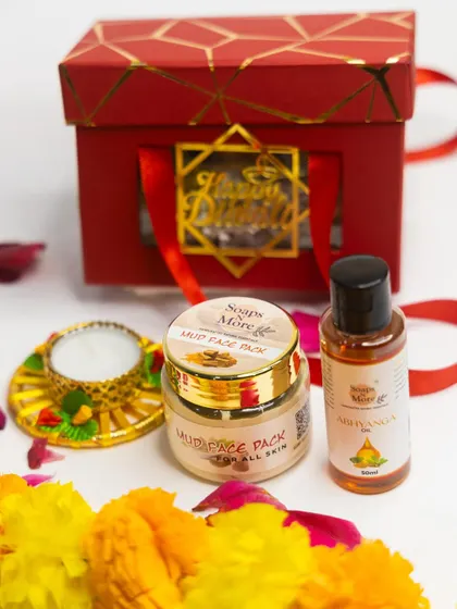 This compact and elegant red Diwali hamper includes our Mud Face Pack, Abhyanga oil, and a traditional diya, perfect for corporate or personal gifting.