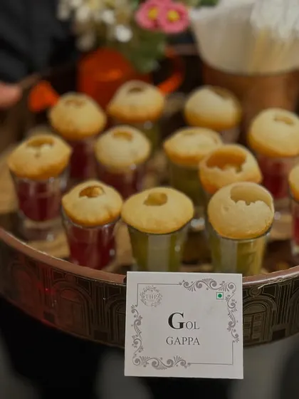 Our innovative take on Gol Gappa, served in individual shot glasses. This presentation is not only stylish but also makes it a mess-free and fun appetizer for guests to enjoy.