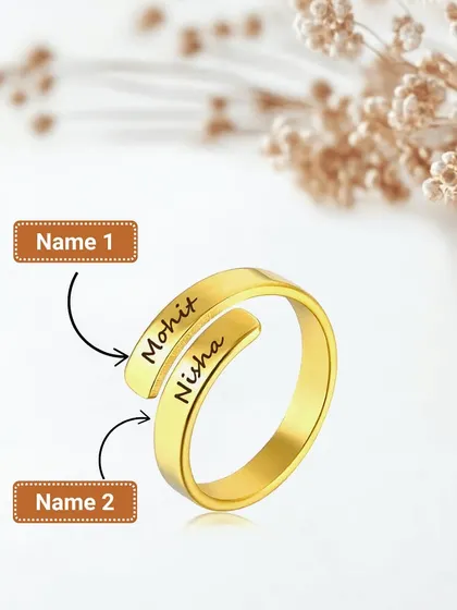This graphic shows exactly where we engrave the two names on our custom couple ring, making it easy to visualize your own personalized piece.
