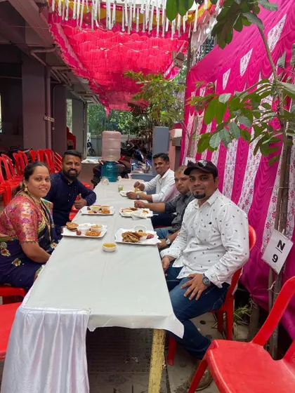 My team and I sharing a meal with the Gole family after their housewarming ceremony. We believe in building lasting relationships with our clients.